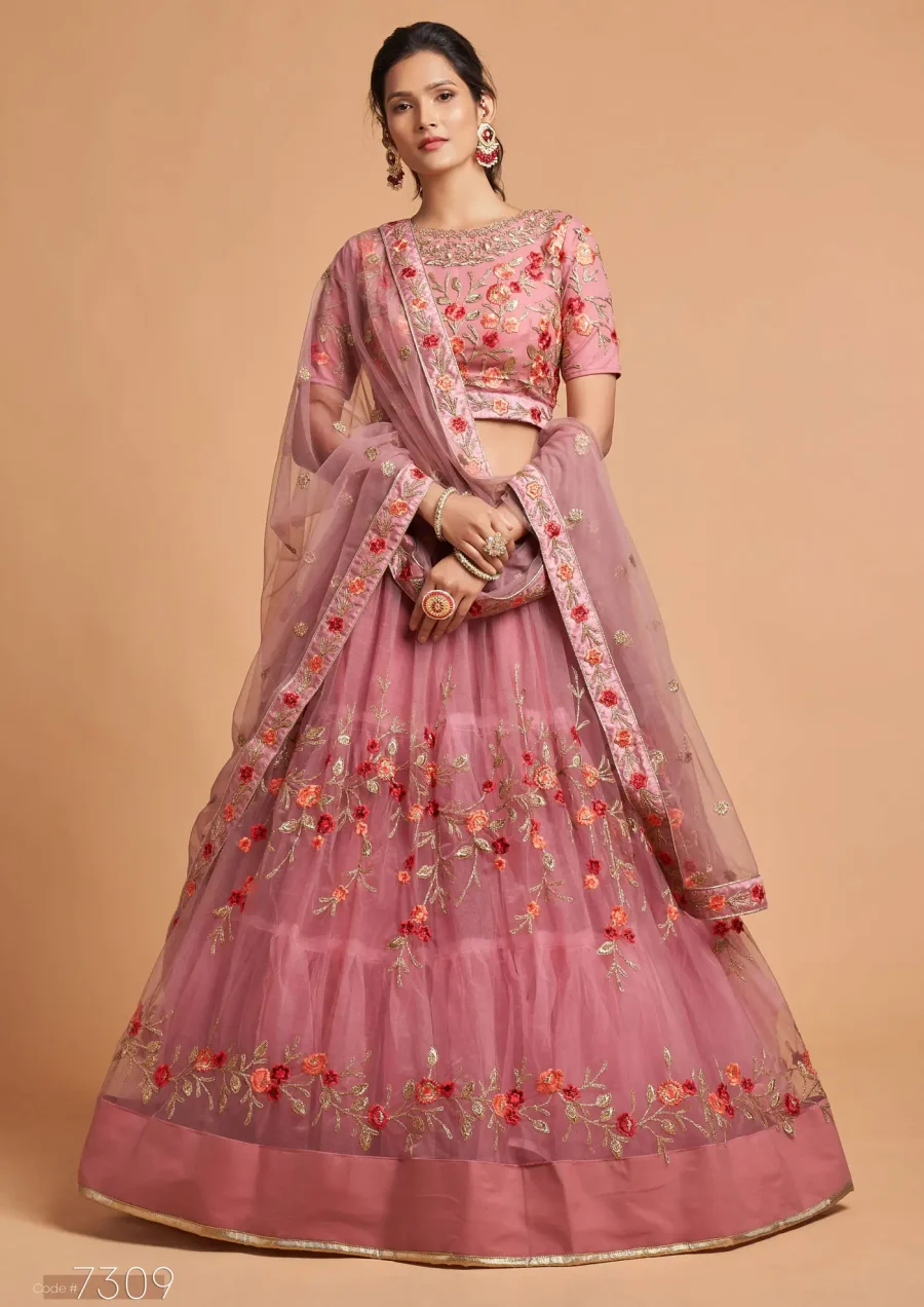 Slaying in Flamingo Pink Net Lehenga Choli with floral Elements