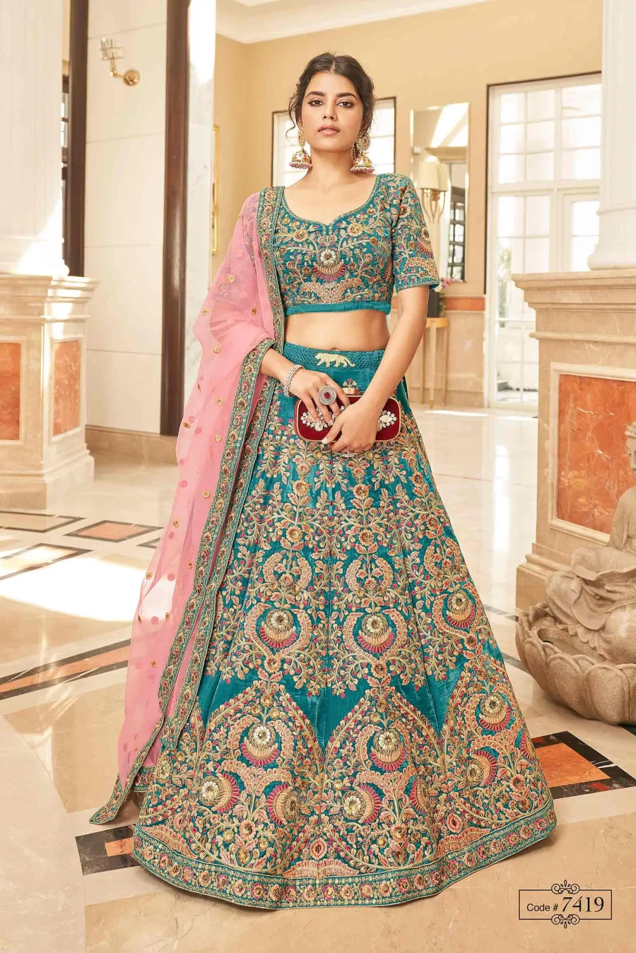 Refreshing and Calm Look of Beautiful Blue Stone Velvet Lehenga Choli