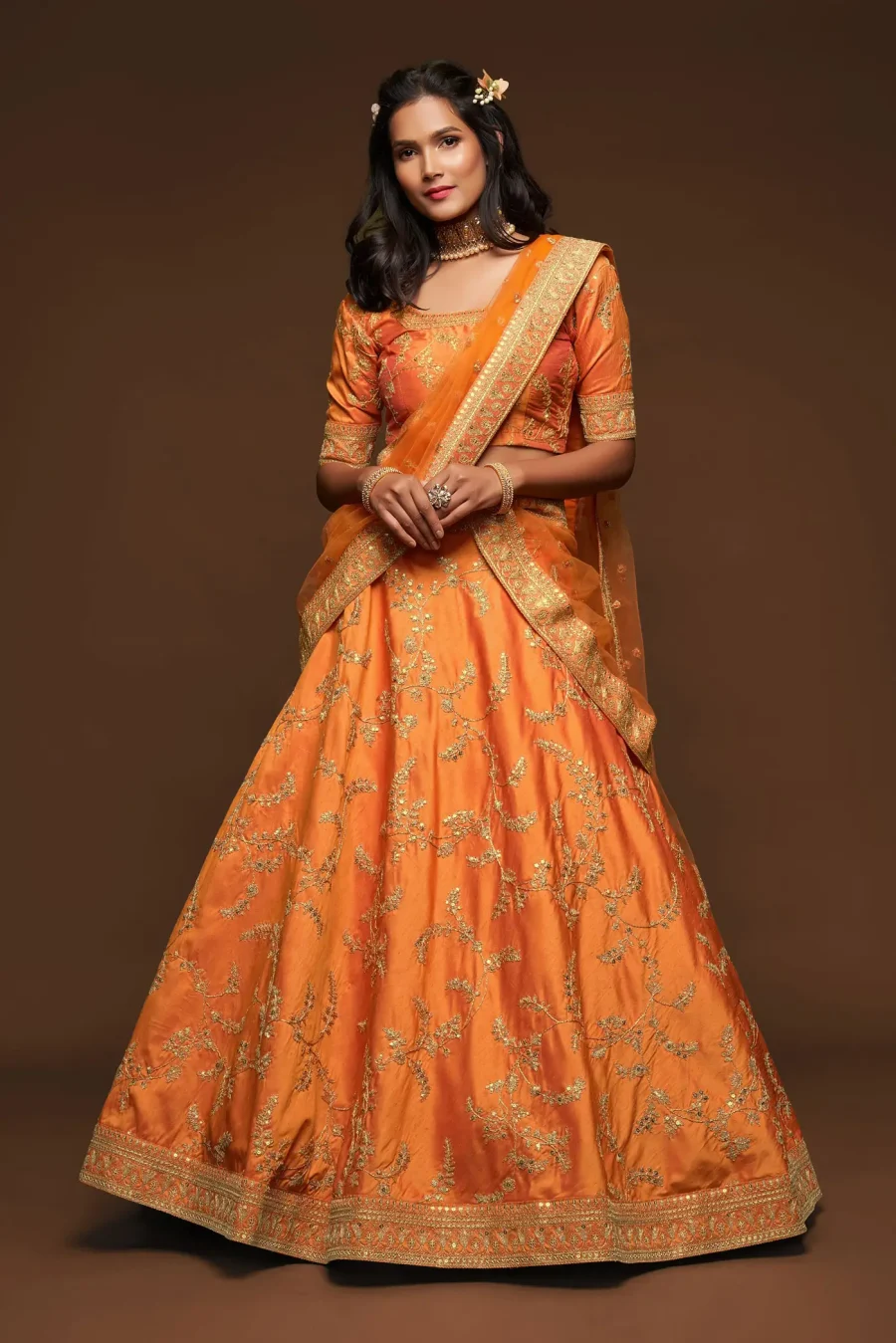 Shimmering Elegance of Dusty Orange Sequence Embroidery Lehenga Choli