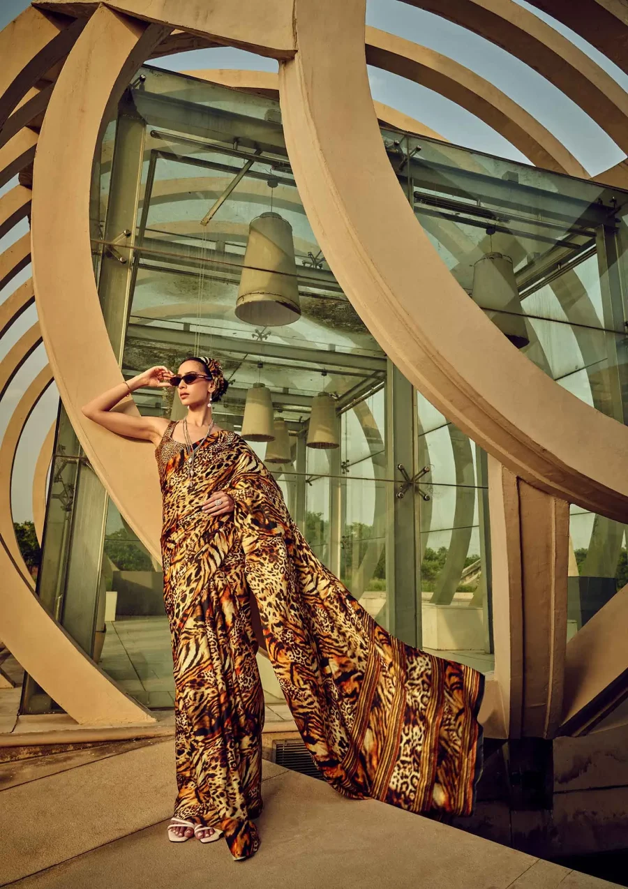 Looking Bold in Tiger Orange Printed Satin Silk Saree