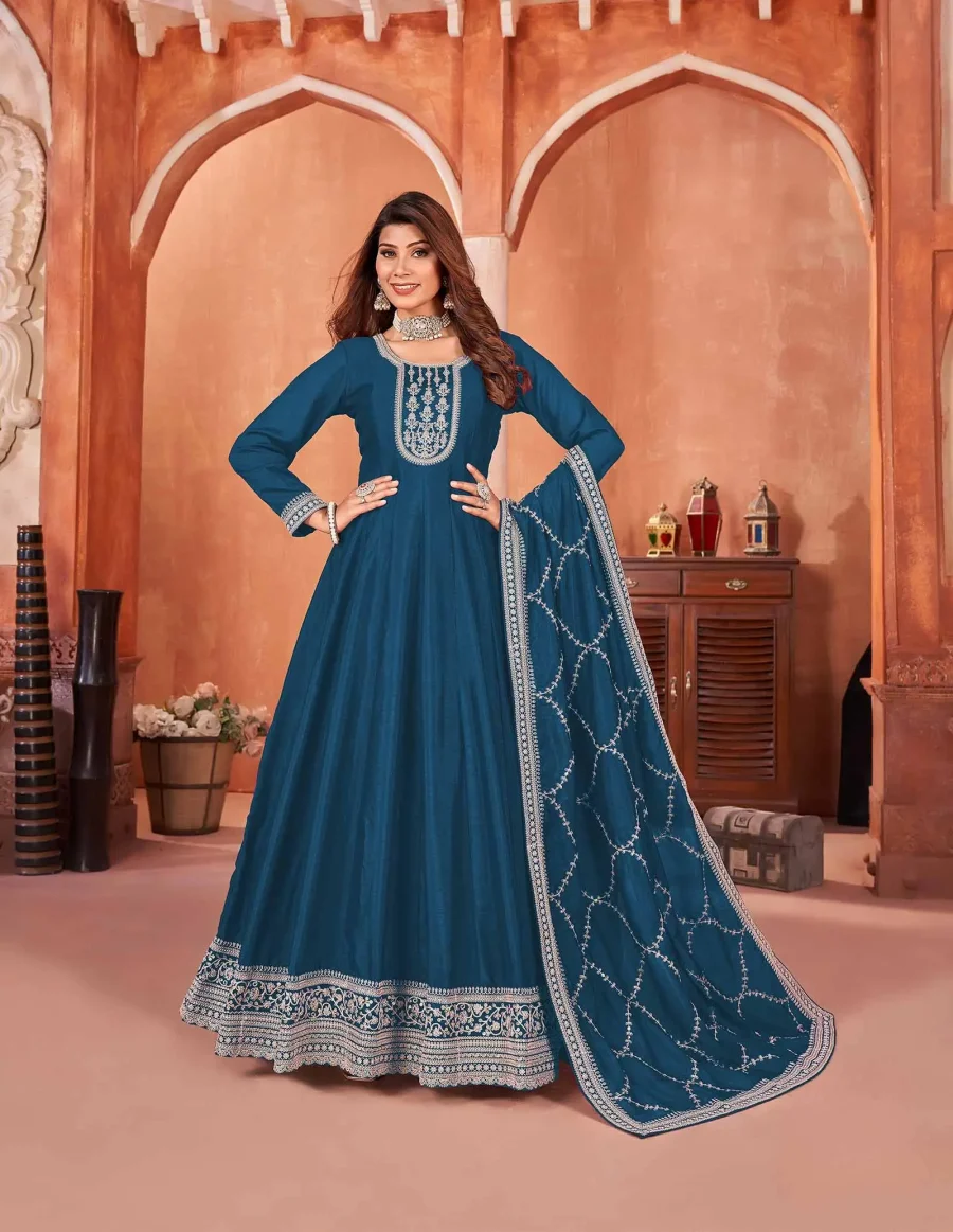 Sapphire Rhymes with with Cathams Blue Embroidery Gown