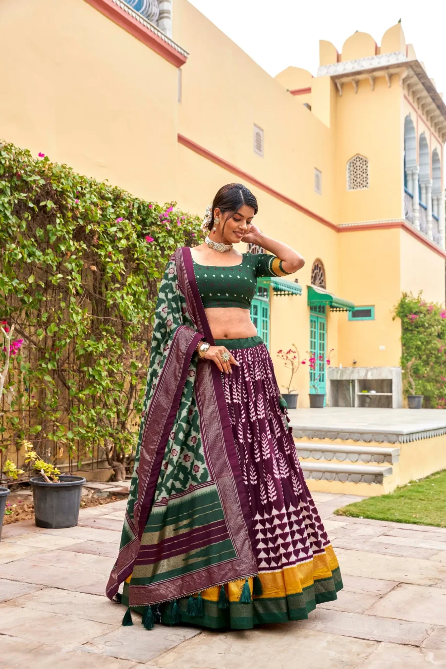 Fabulous blend of Pansy Purple and Lunar Green silk Patola lehenga choli