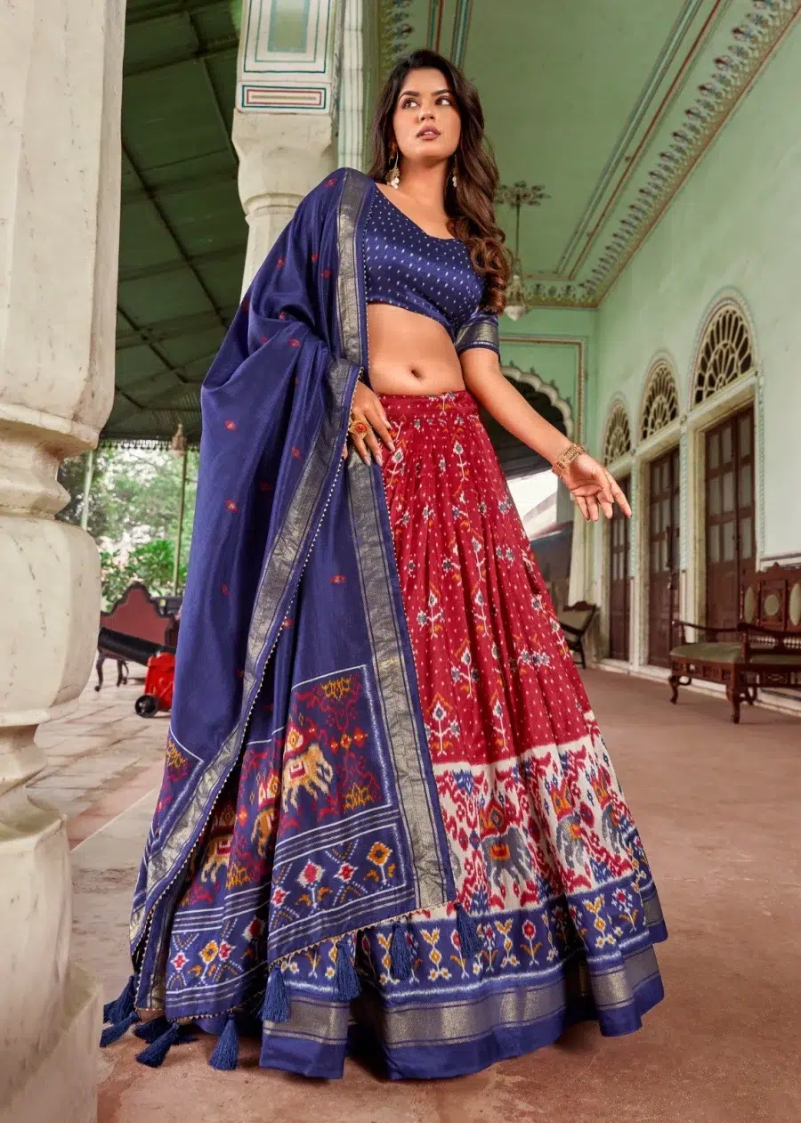 Bright maroon Silk patola Lehenga with dark slate blue blouse and dupatta