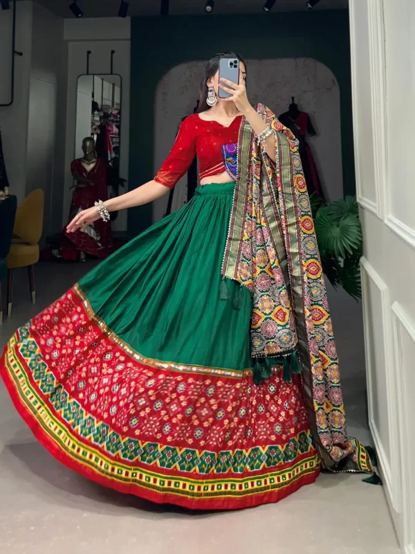 Green color silk lehenga choli with printed gamthi lace