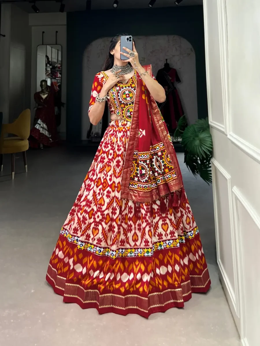 Egg white Navratri lehenga choli with Patola print & Gamthi work