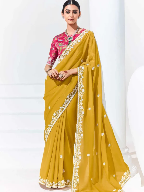 Yellow color embroidered sequence saree