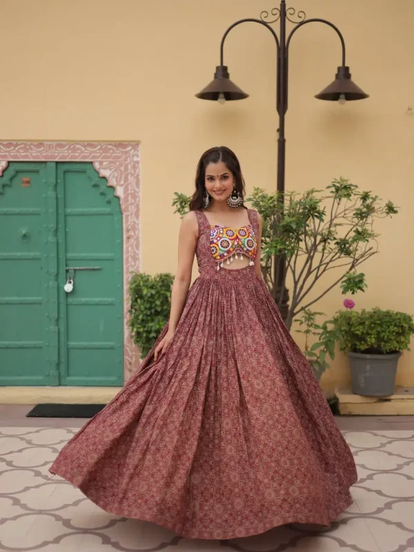 maroon color festive wear gown