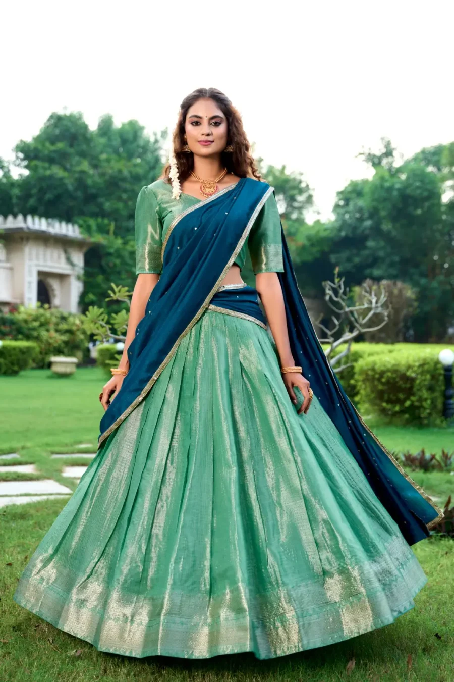 Elegance in Green Kanchipuram Lehenga choli with Sequins And Thread Embroidery Work